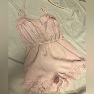 Pale peach romper - sheer back panel - ruffle hem